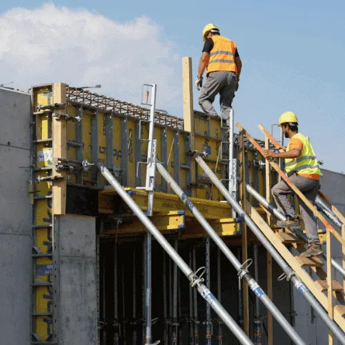 building-construction-project Construction workers on a job site for commercial renovation projects