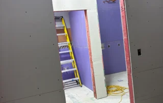 Scenthound interior construction progress phase snapshot - drywall installation