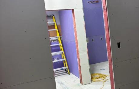 Scenthound interior construction progress phase snapshot - drywall installation