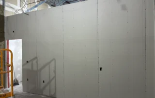 Scenthound interior construction progress phase snapshot - drywall installation
