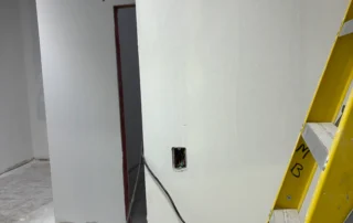 Scenthound interior construction progress phase snapshot - primed wall