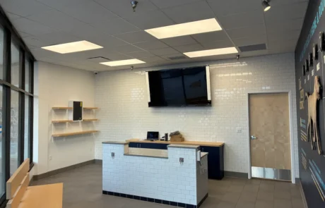 Post-construction snapshot of lobby interior with custom receptionist area