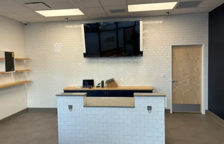 Post-construction snapshot of lobby interior with custom receptionist area